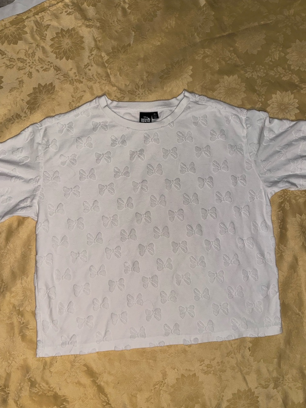 Disney White Short Sleeve Tee with Embossed Bow Pattern